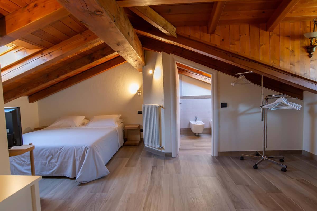Appartamento Zerbion (100 mt. from the hotel) | أغطية فراش متميزة وأسرّة بإسفنج يتكيف مع شكل الجسم وخزنة داخل الغرفة