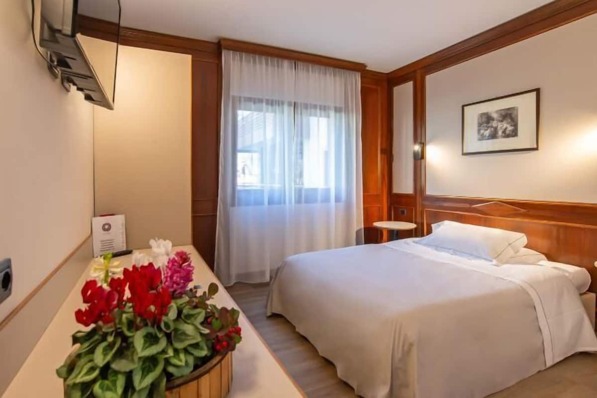 1 habitación y ropa de cama de alta calidad