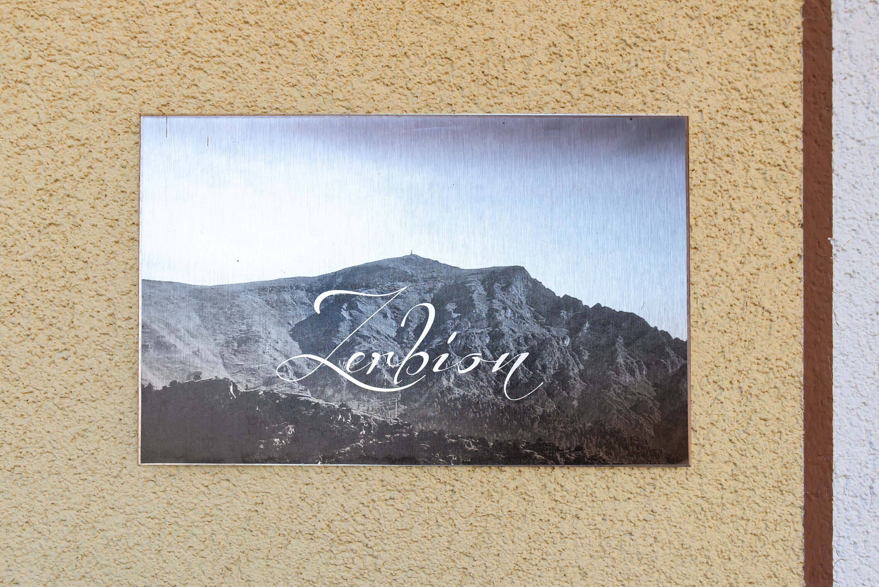 A framed picture of a mountain with the word "Zermatt" on it.
