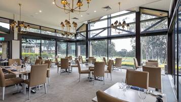 Breakfast, lunch, dinner served; golf course views