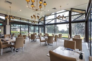 Breakfast, lunch, dinner served; golf course views 