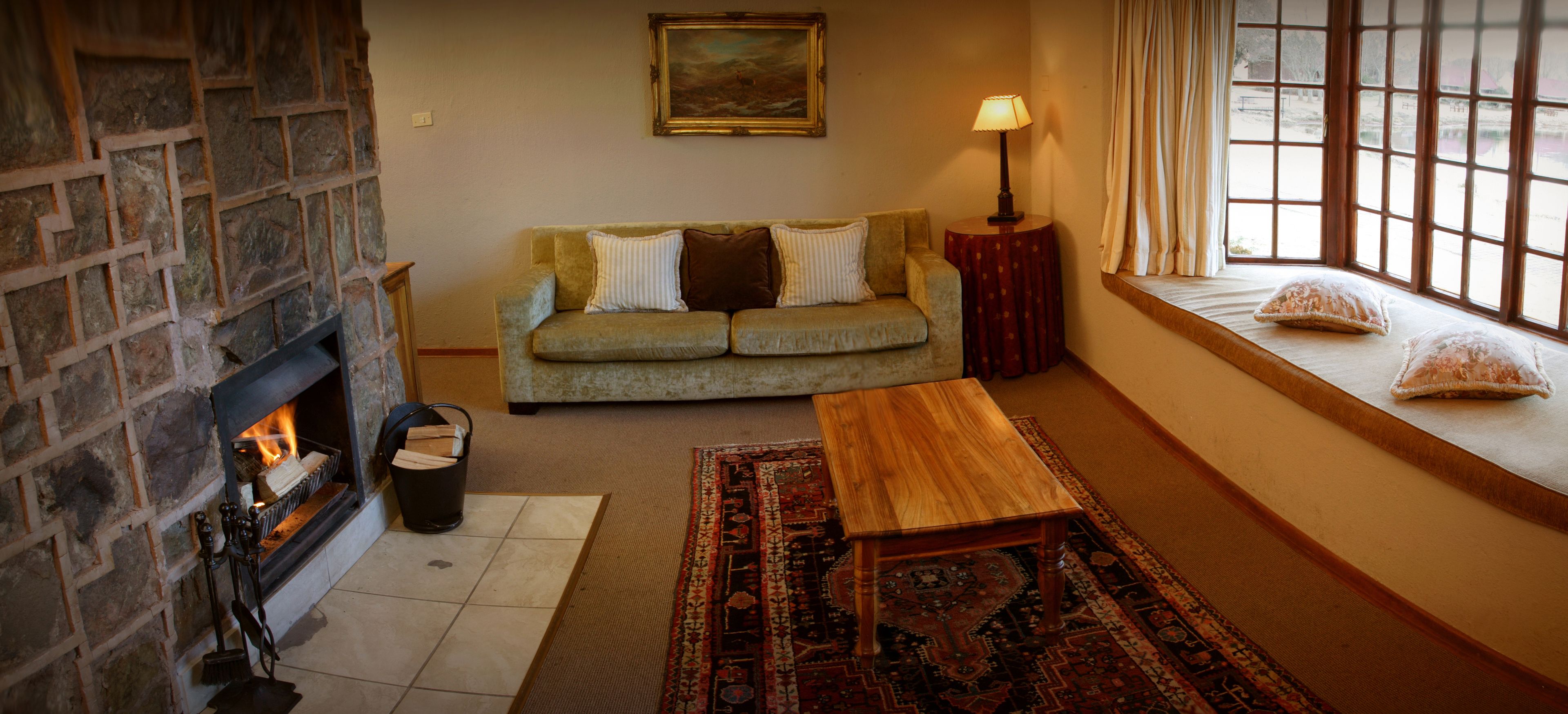 royal suite | living area | tv, fireplace