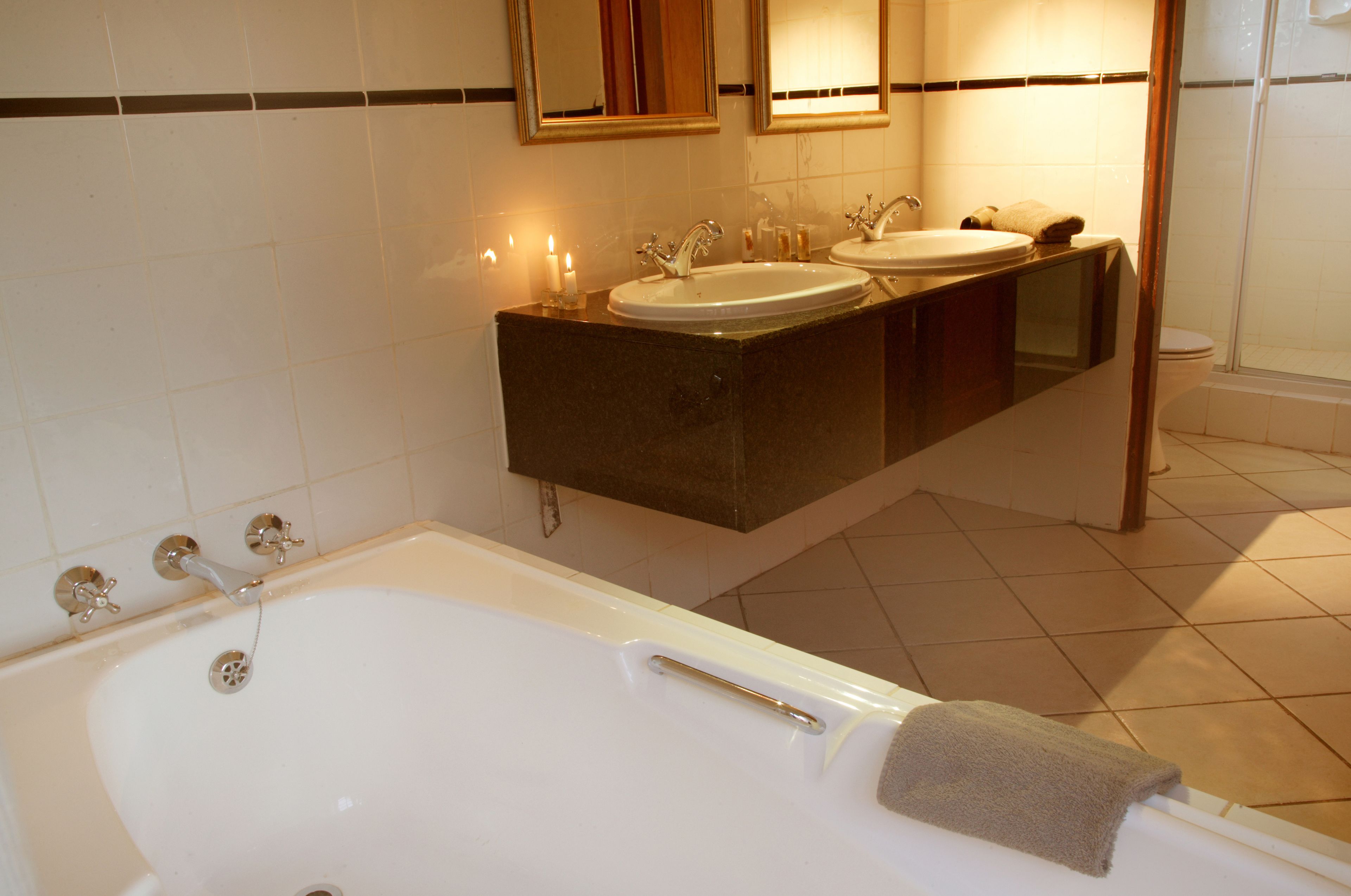 luxury lakeside room | bathroom | separate bathtub and shower, deep-soaking bathtub, free toiletries