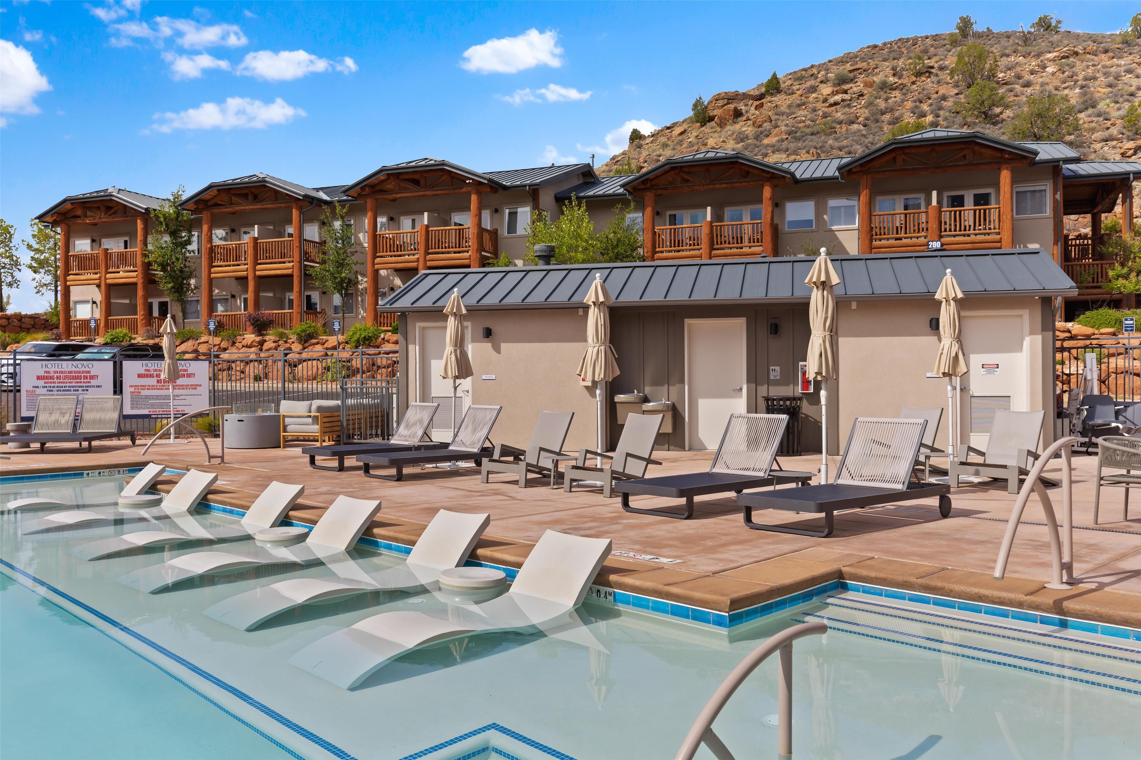 Seasonal outdoor pool, open 8:00 AM to 10:00 PM, sun loungers