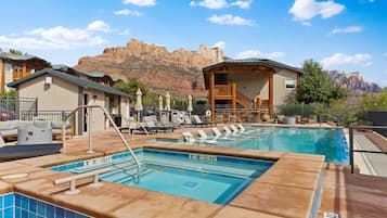 Outdoor pool, open 8:00 AM to 10:00 PM, pool umbrellas, sun loungers