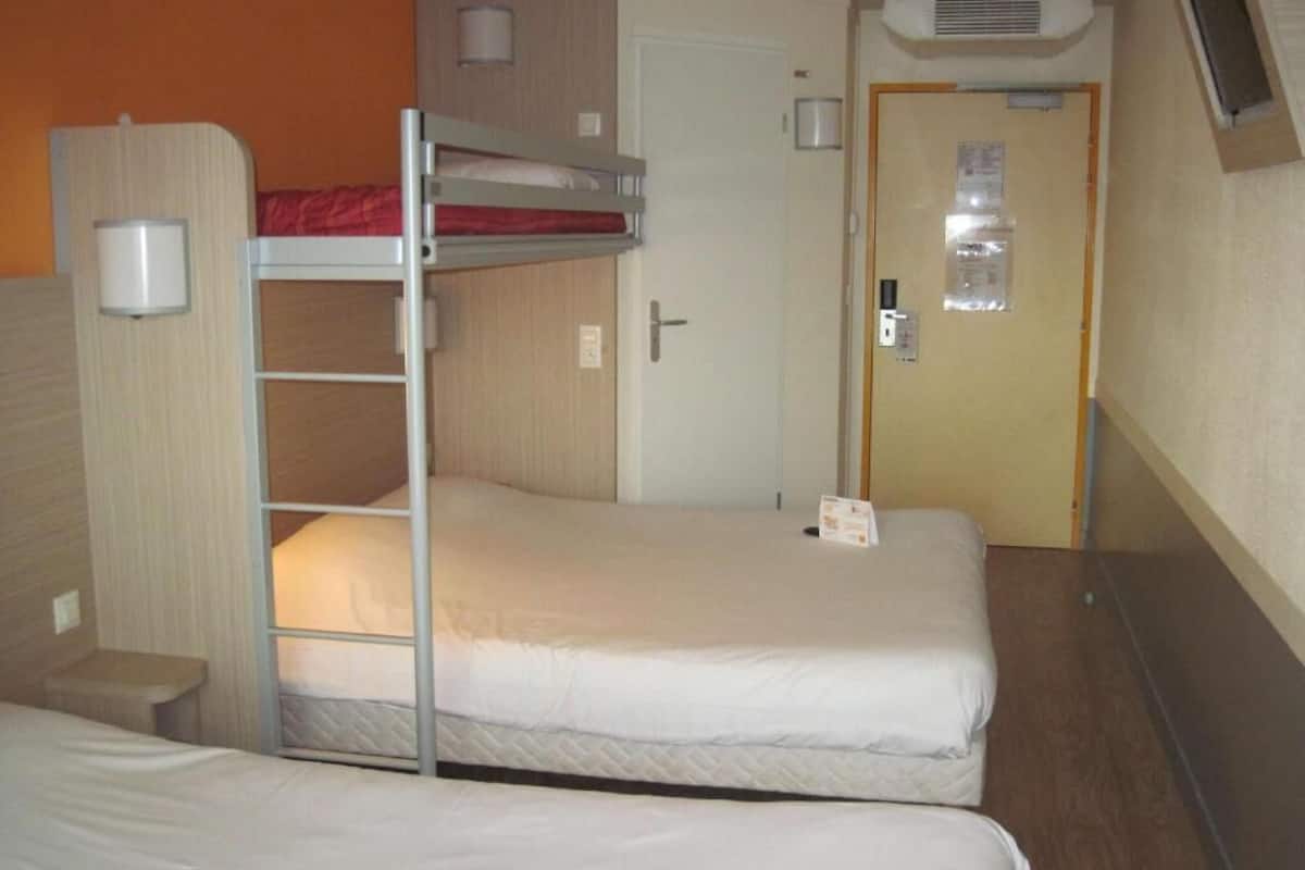 Desk, blackout drapes, soundproofing, free cribs/infant beds