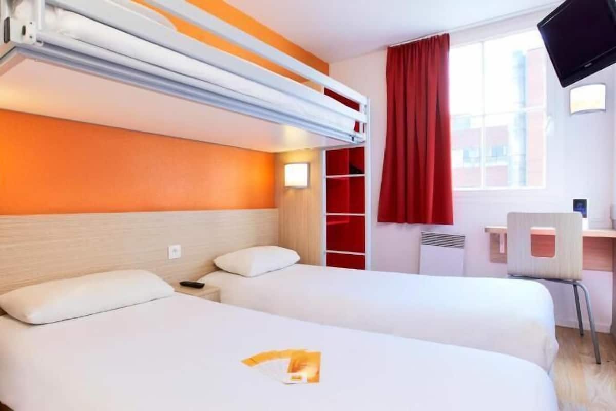 Desk, blackout drapes, soundproofing, free cribs/infant beds