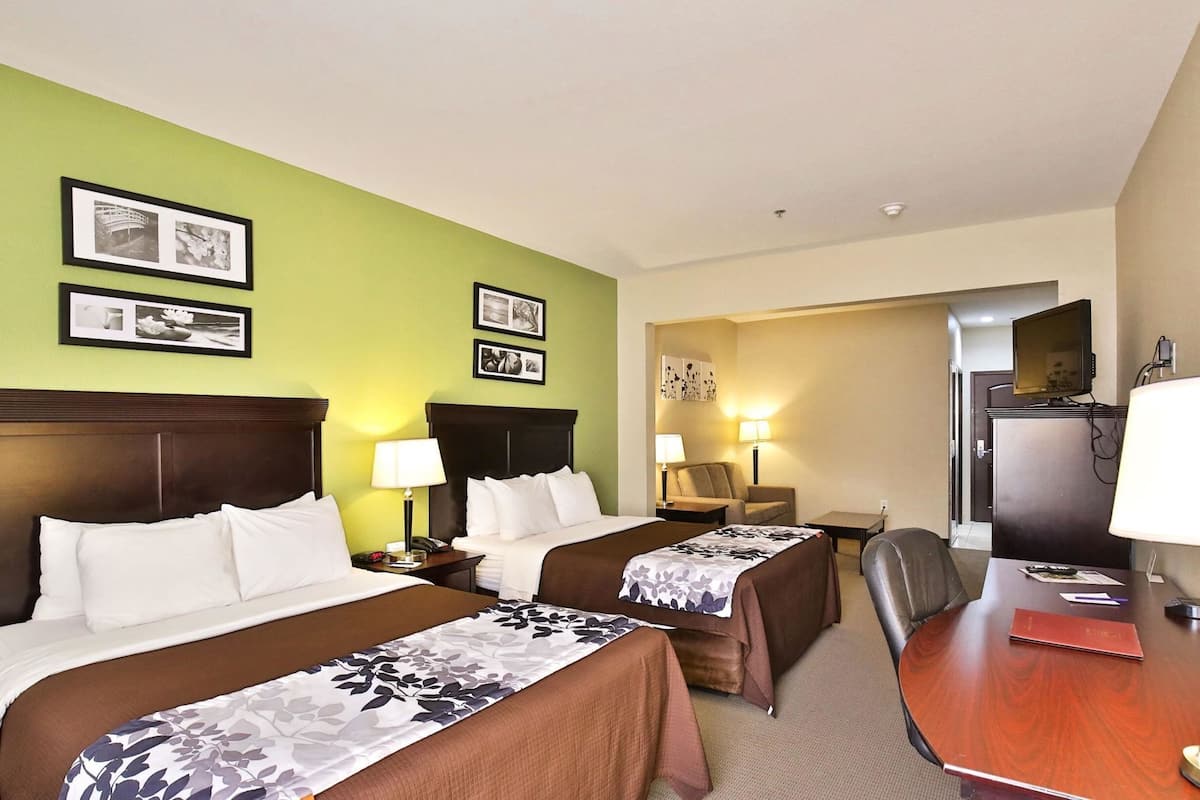 Premium bedding, desk, laptop workspace, blackout curtains