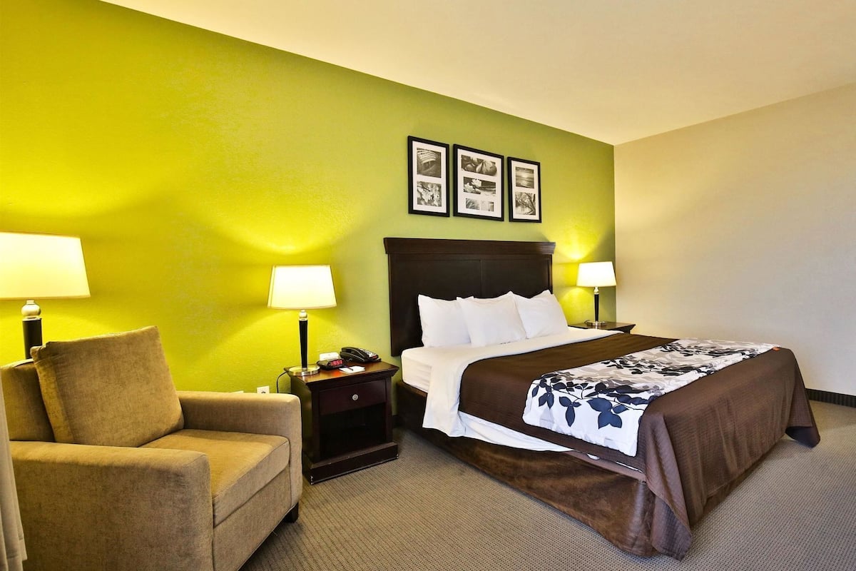 Premium bedding, desk, laptop workspace, blackout curtains