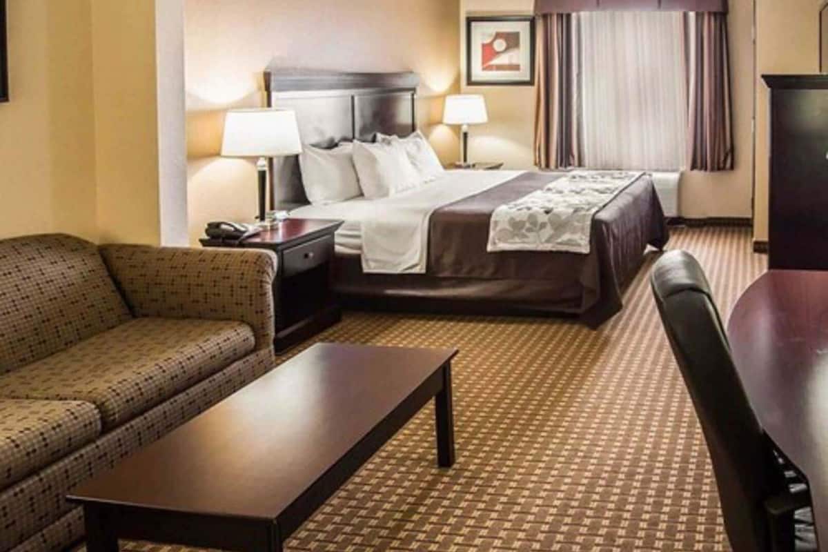 Premium bedding, desk, laptop workspace, blackout curtains