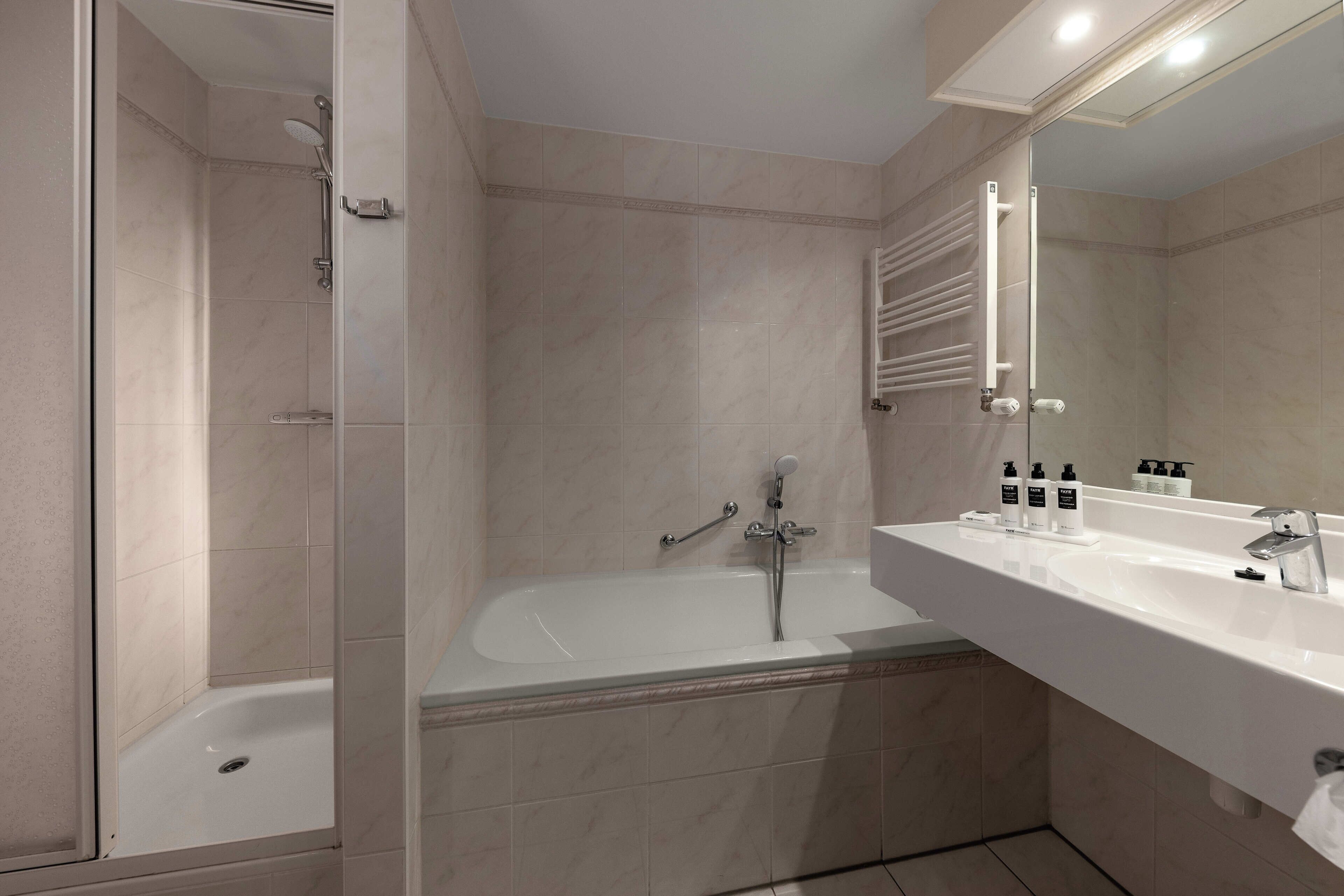 separate bathtub and shower, eco-friendly toiletries, hair dryer, towels