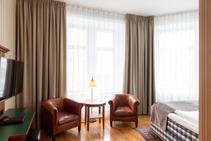 Superior Double or Twin Room | Living area | TV