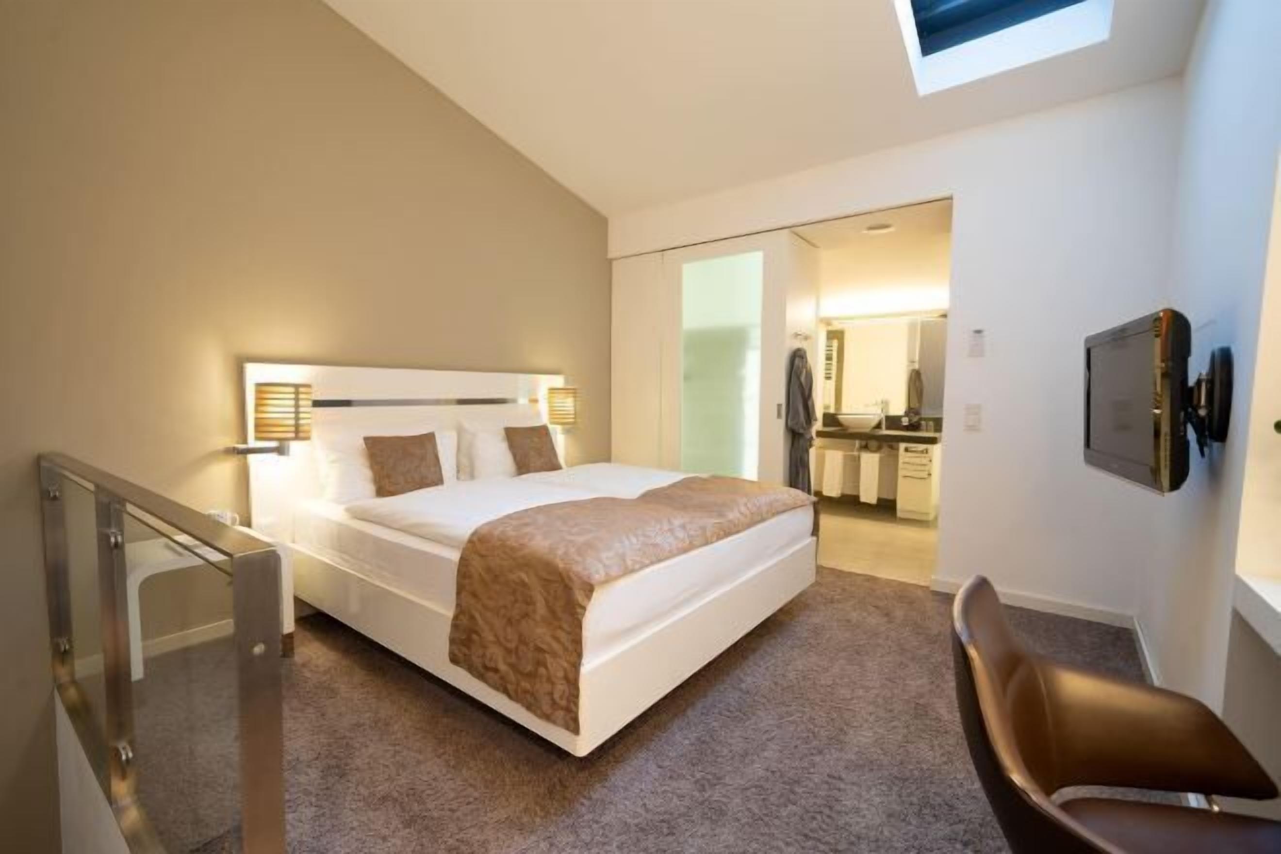 Minibar, desk, blackout curtains, iron/ironing board