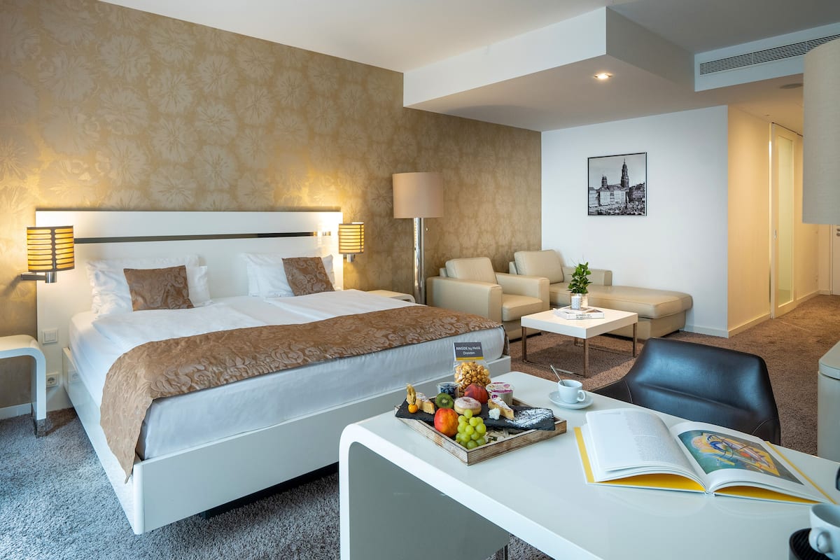 Premium bedding, down duvets, Select Comfort beds, free minibar
