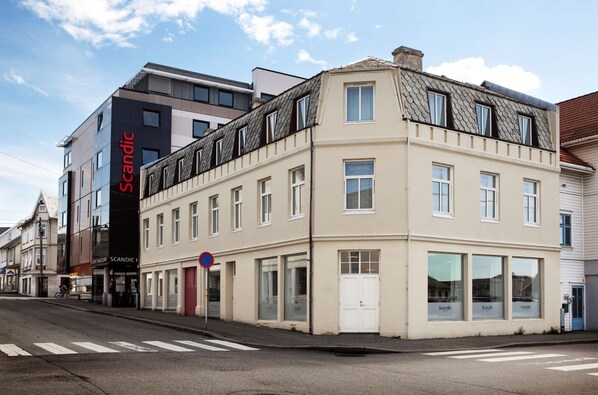 A building with a modern facade, large windows, and a sign reading "Scandic". - Scandic Haugesund (Haugesund)