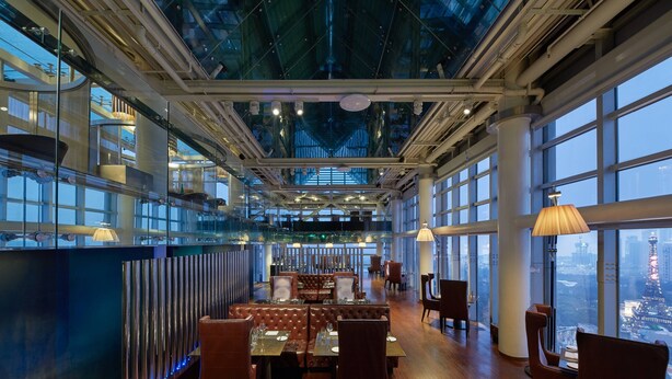 A spacious restaurant with high ceilings, large windows, and modern interior design. - The Westin Shenzhen Nanshan (Shenzhen)