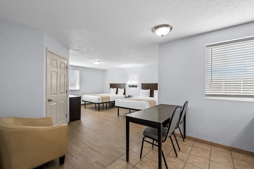 Suite, 2 Queen Beds, Non Smoking (Upgrade) | Desk, iron/ironing board, free WiFi, bed sheets