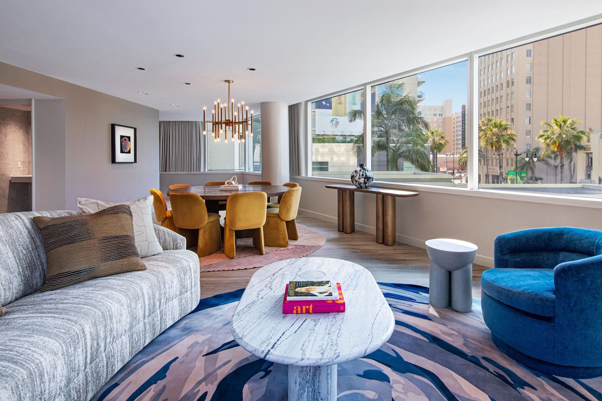 Mega Suite | Living room | 42-inch flat-screen TV with cable channels, TV, iPod dock