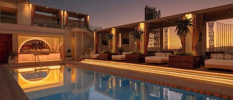 Seasonal outdoor pool, pool cabanas (surcharge), pool umbrellas