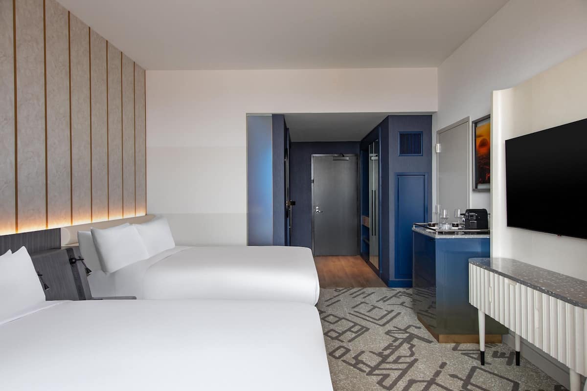 Premium bedding, down comforters, minibar, in-room safe