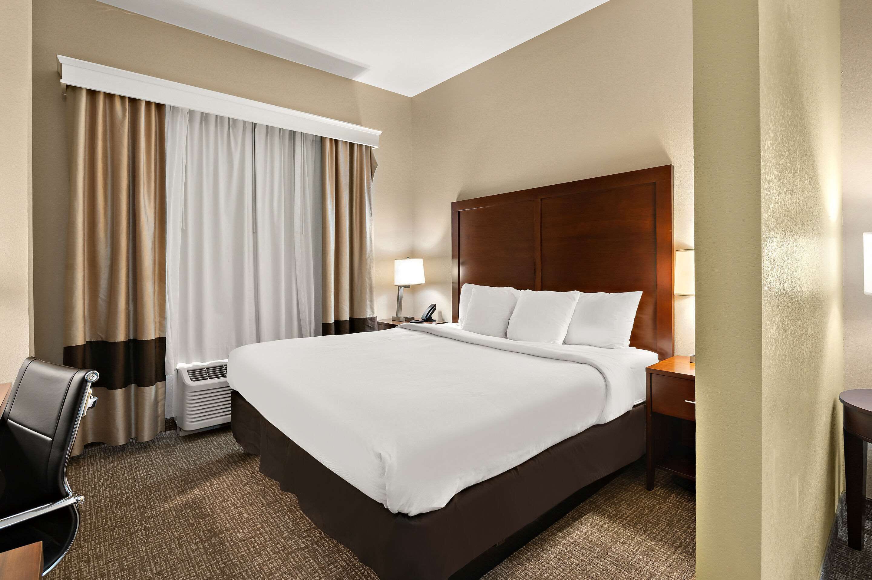 suite, 1 king bed with sofa bed | laptop workspace, blackout curtains, iron/ironing board