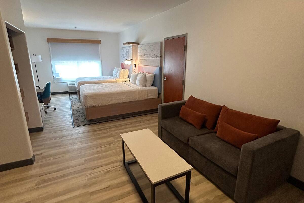 suite, 2 queen beds, non smoking, refrigerator & microwave (shower only;with sofabed) | 1 bedroom, desk, laptop workspace, iron/ironing board