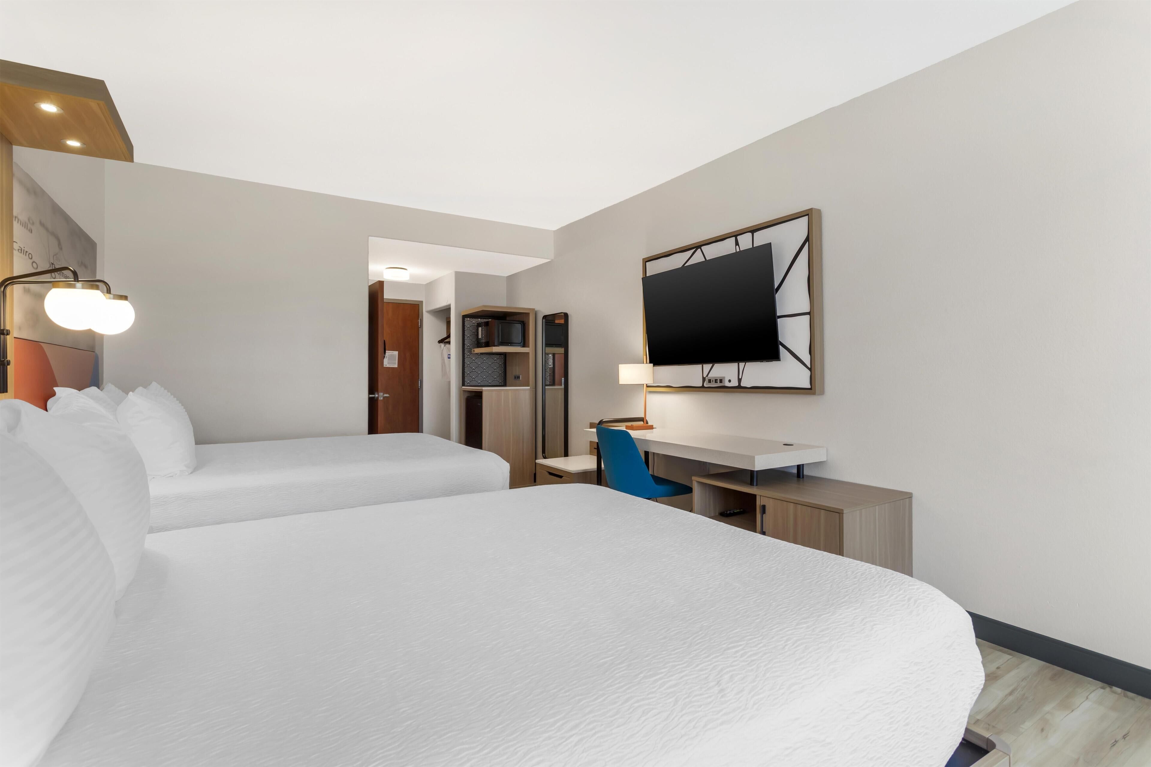 Standard Room, 2 Queen Beds, Non Smoking, Refrigerator & Microwave (Shower Only) | Desk, laptop workspace, iron/ironing board, cots/infant beds