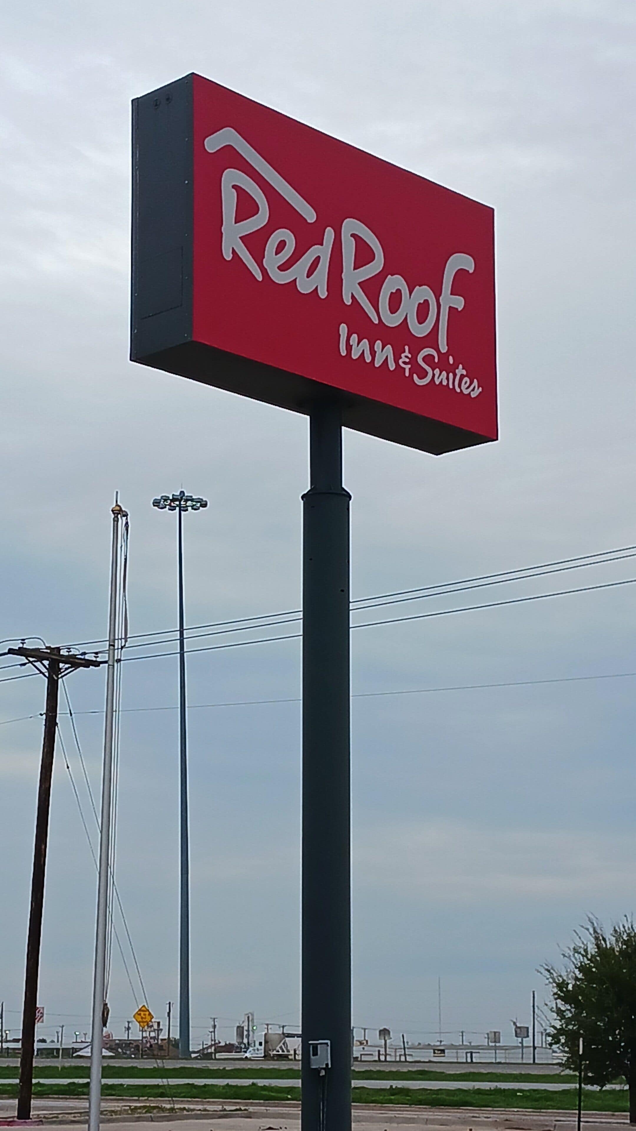 Señal de Red Roof Inn & Suites.