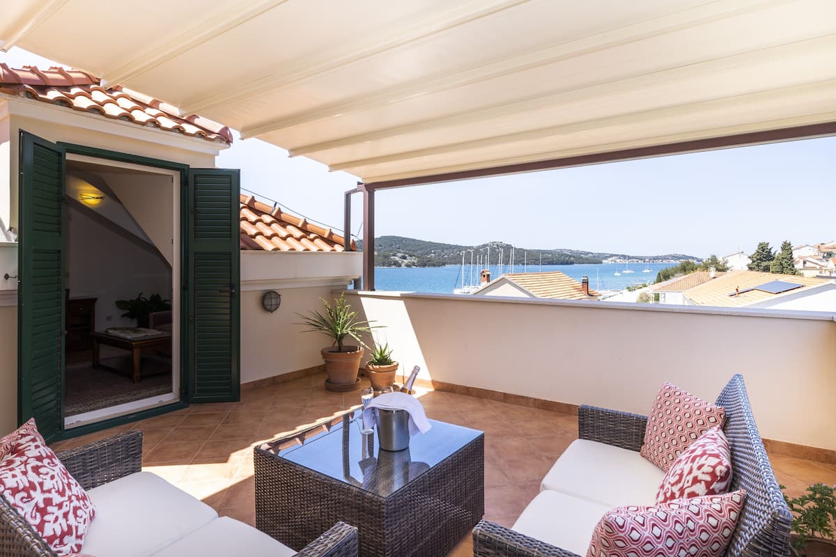Suíte luxo, vista para o mar | Terraço/pátio