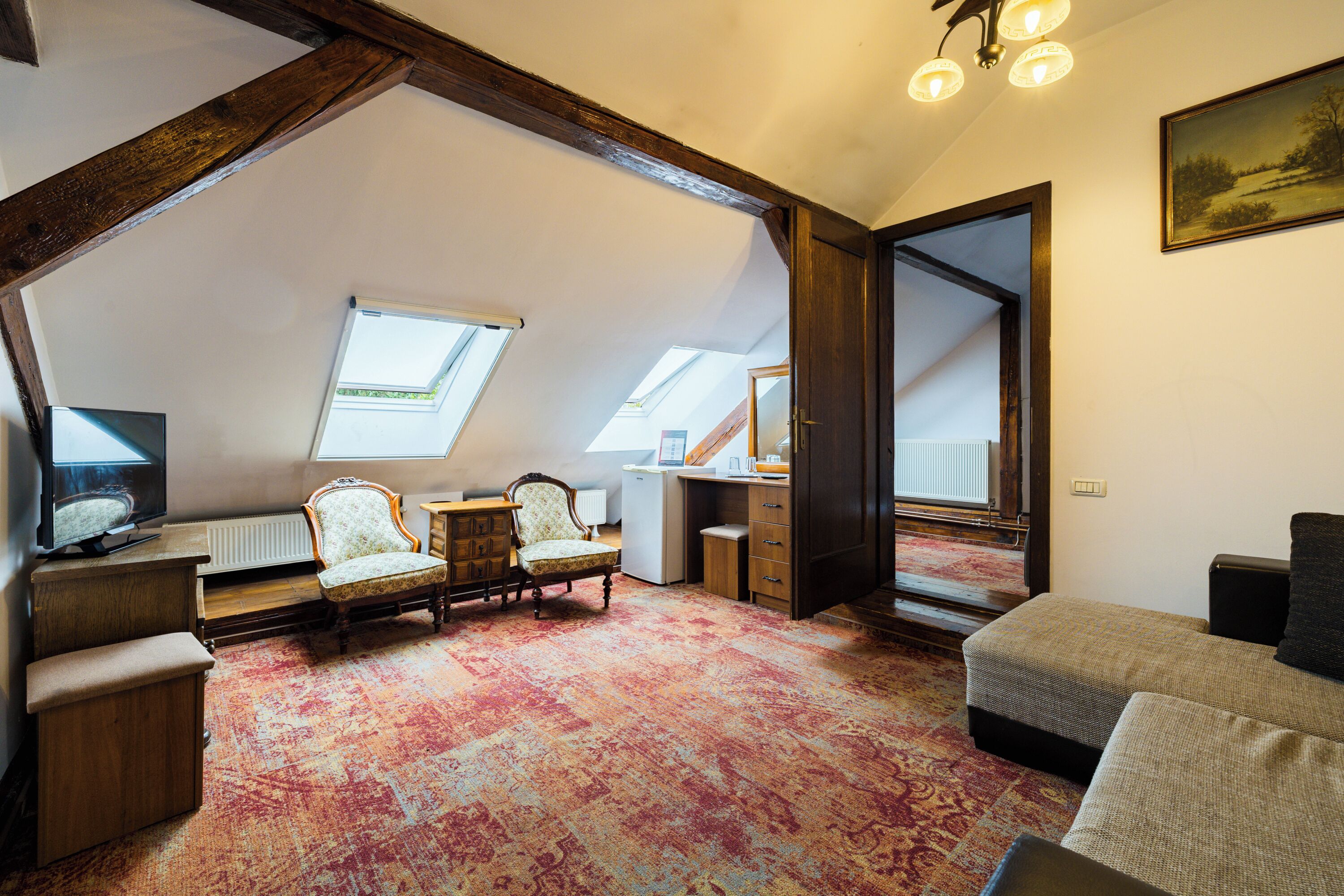 Suite, 1 Bedroom | Living area | 82-cm LED TV with cable channels, TV