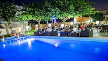 Outdoor pool, open 8:30 AM to 6 PM, pool umbrellas, sun loungers