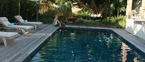 Outdoor pool, pool umbrellas, sun loungers