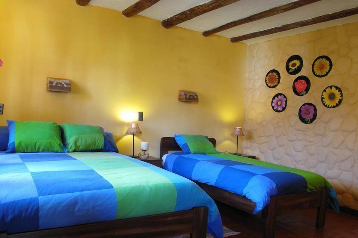 Triple Room | Minibar, desk