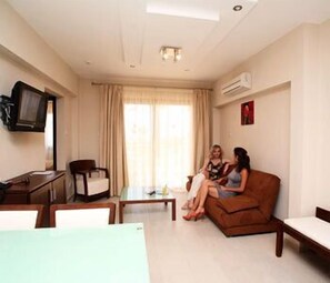 Superior Apartment, 1 Bedroom | Living room | 25-inch flat-screen TV with cable channels, TV - Avillion Holiday Apartments (Chlorakas)