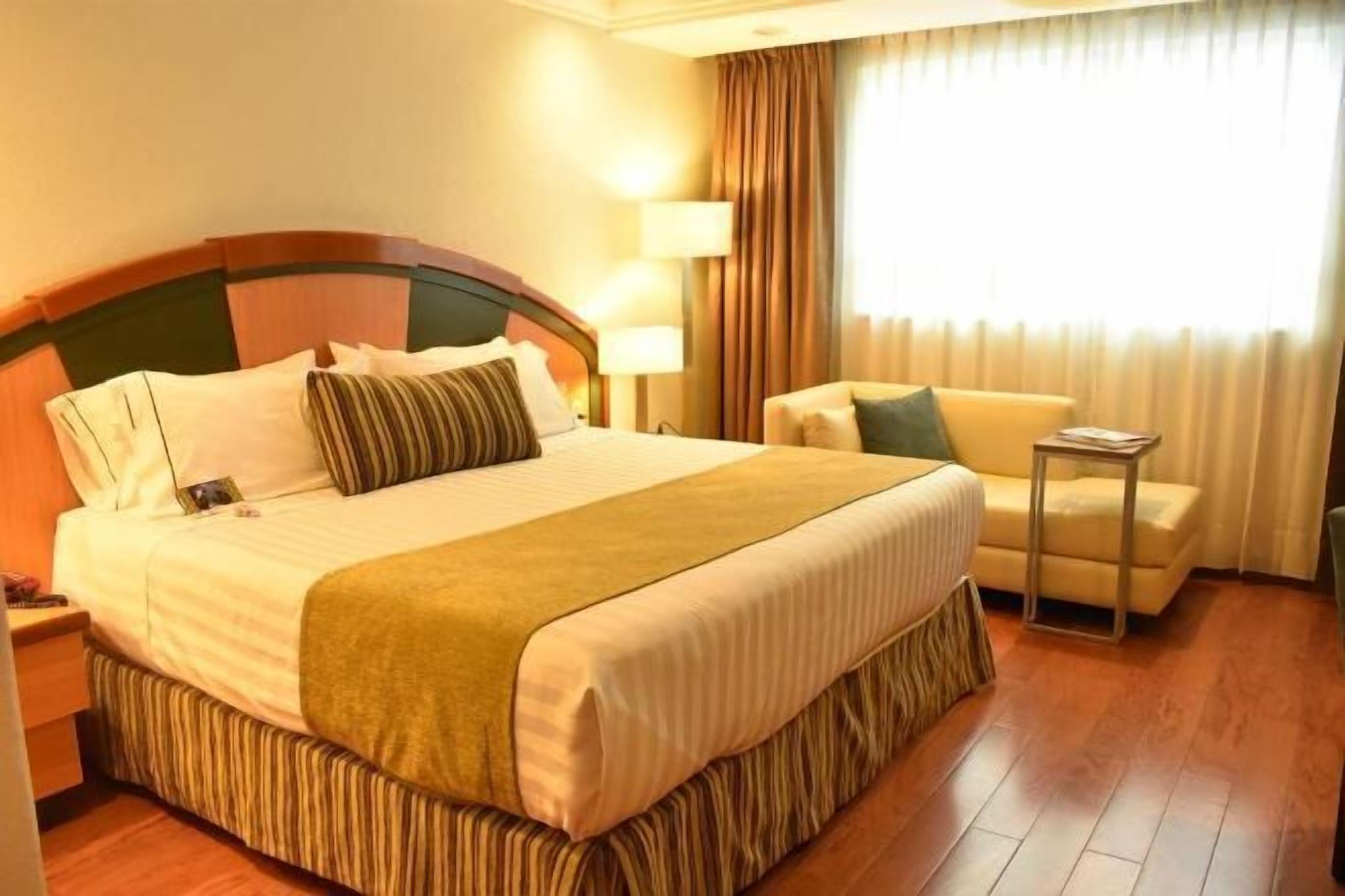 Premium bedding, down duvets, Select Comfort beds, in-room safe