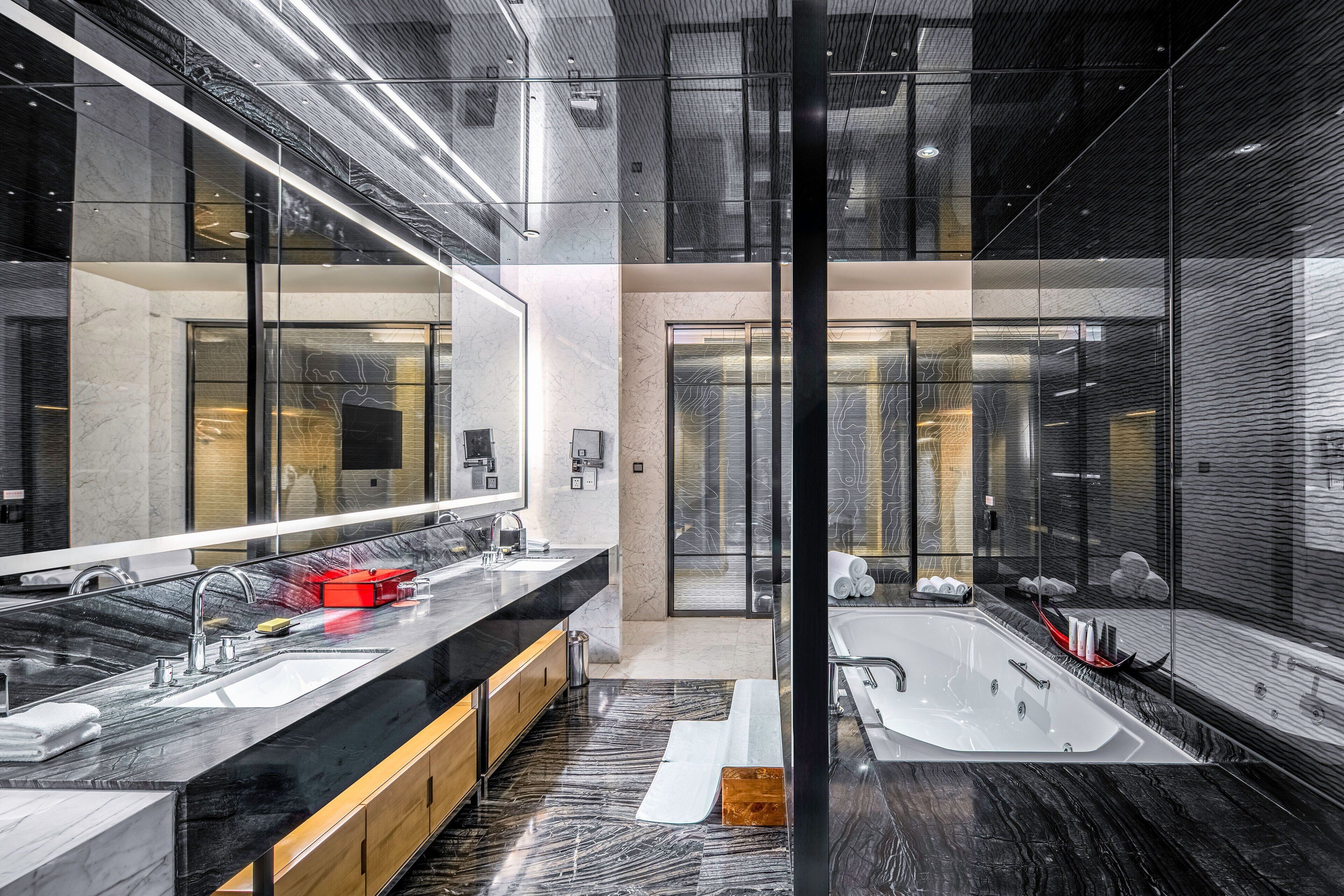 separate bathtub and shower, free toiletries, hair dryer, bathrobes