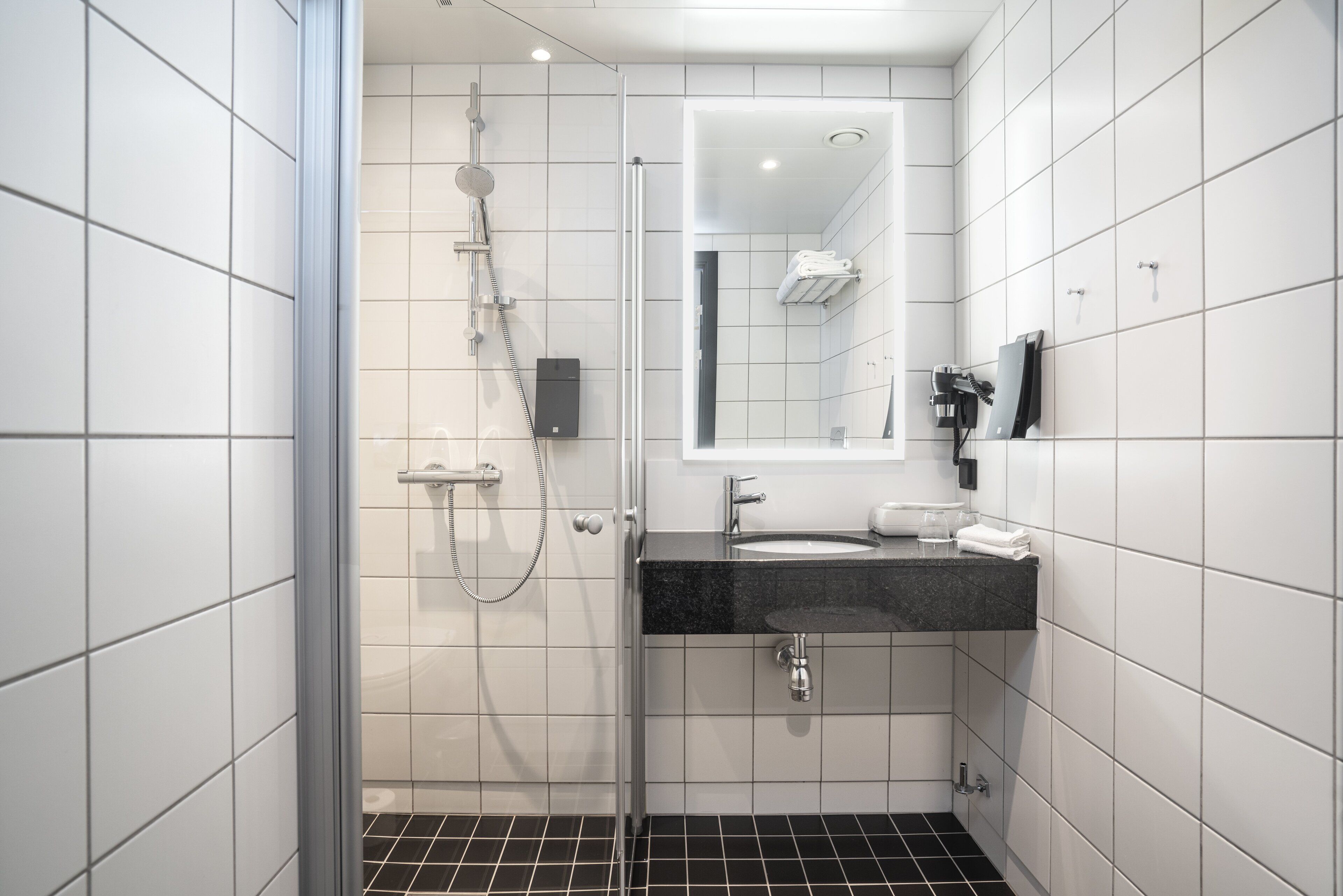 shower, eco-friendly toiletries, hair dryer, towels