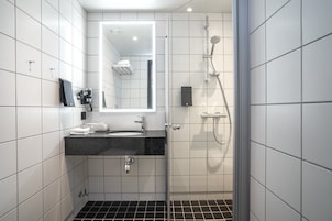 Shower, eco-friendly toiletries, hair dryer, towels