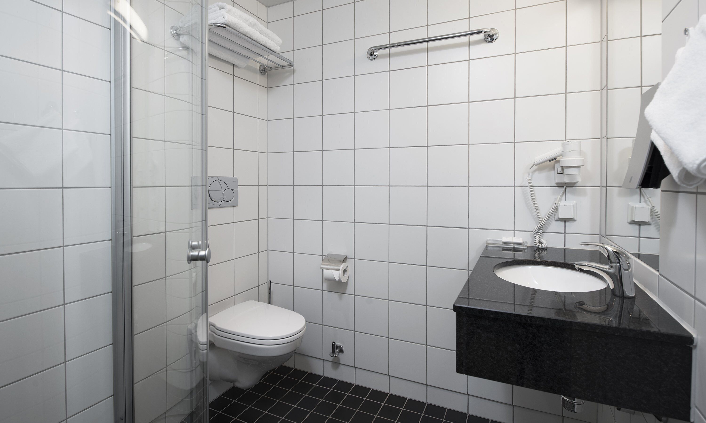 shower, eco-friendly toiletries, hair dryer, towels