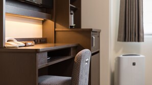 A compact kitchenette with a microwave, a small refrigerator, and a flat-screen TV mounted above the counter. - Hotel MyStays Kyoto - Shijo (Kyoto)