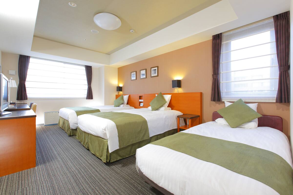 Premium bedding, down duvets, in-room safe, desk