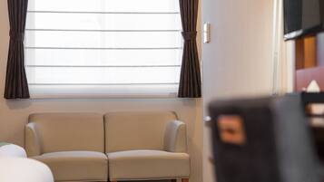Premium bedding, down comforters, in-room safe, desk