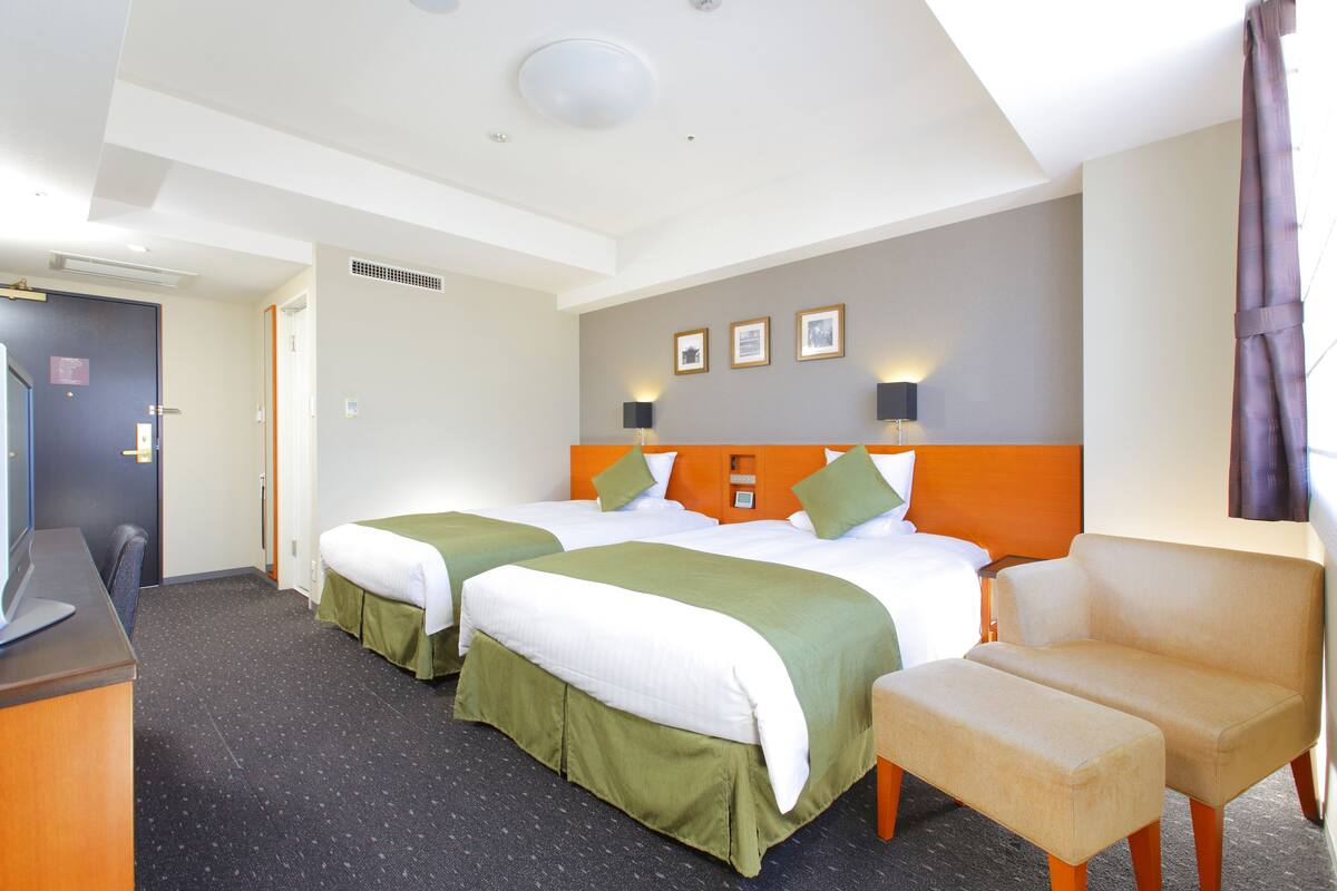 Premium bedding, down duvets, in-room safe, desk