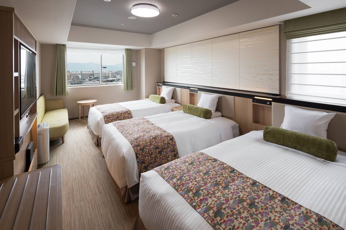 Premium bedding, down duvets, in-room safe, desk