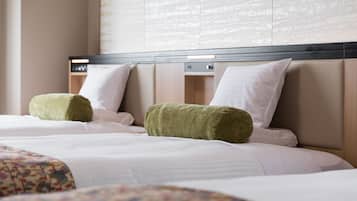 Premium bedding, down comforters, in-room safe, desk