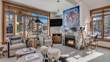 Luxury Condo, 2 Bedrooms | Living room | LCD TV, fireplace, video game console, DVD player
