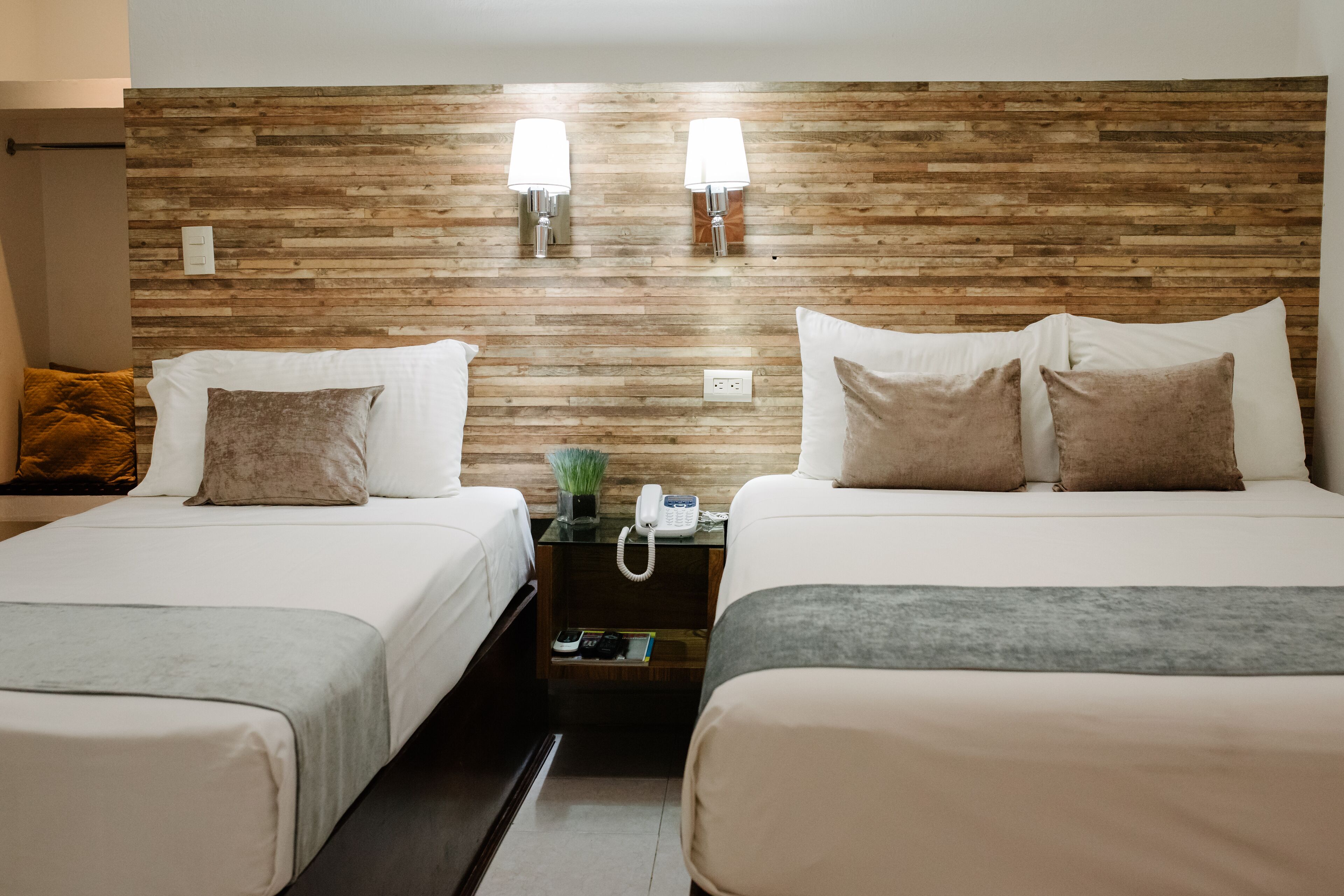 junior quadruple room, multiple beds, tower | 1 bedroom, premium bedding, pillow-top beds, individually furnished