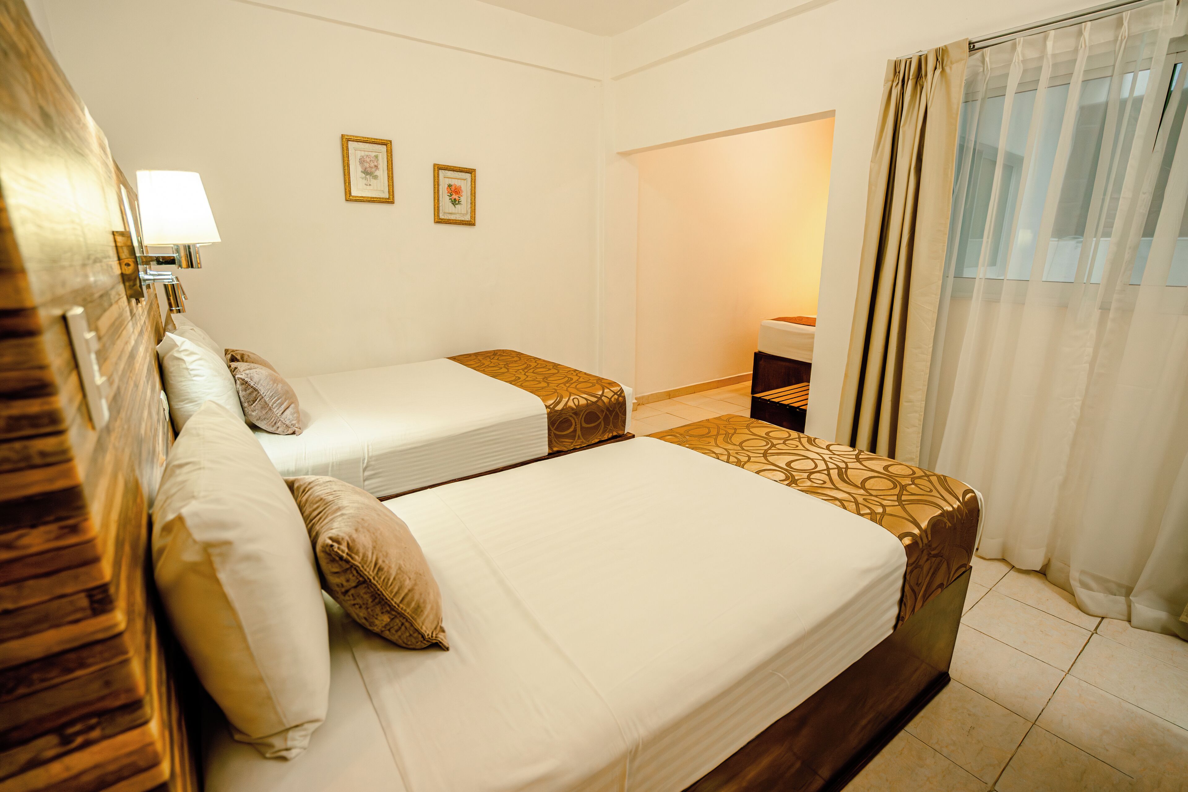 Junior Quadruple Room, Multiple Beds, Tower | Premium bedding, pillowtop beds, individually furnished, desk