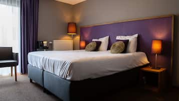 Deluxe Room | Pillow-top beds, in-room safe, desk, laptop workspace