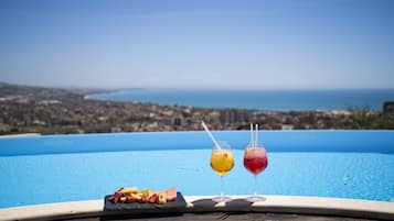 Seasonal outdoor pool, pool loungers